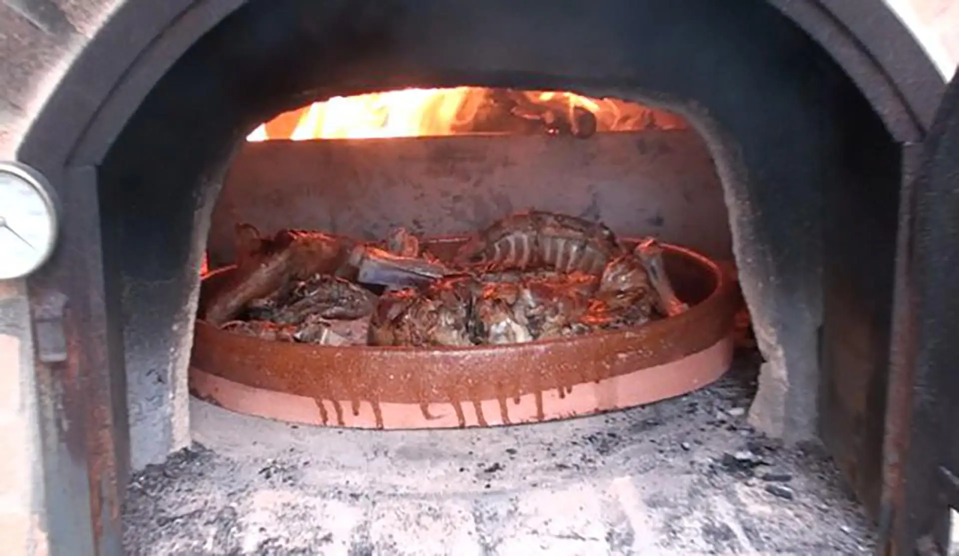 Lechazo al horno de lena