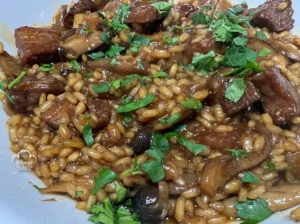 Arroz meloso de secreto ibérico y setas