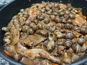 Conejo con Caracoles